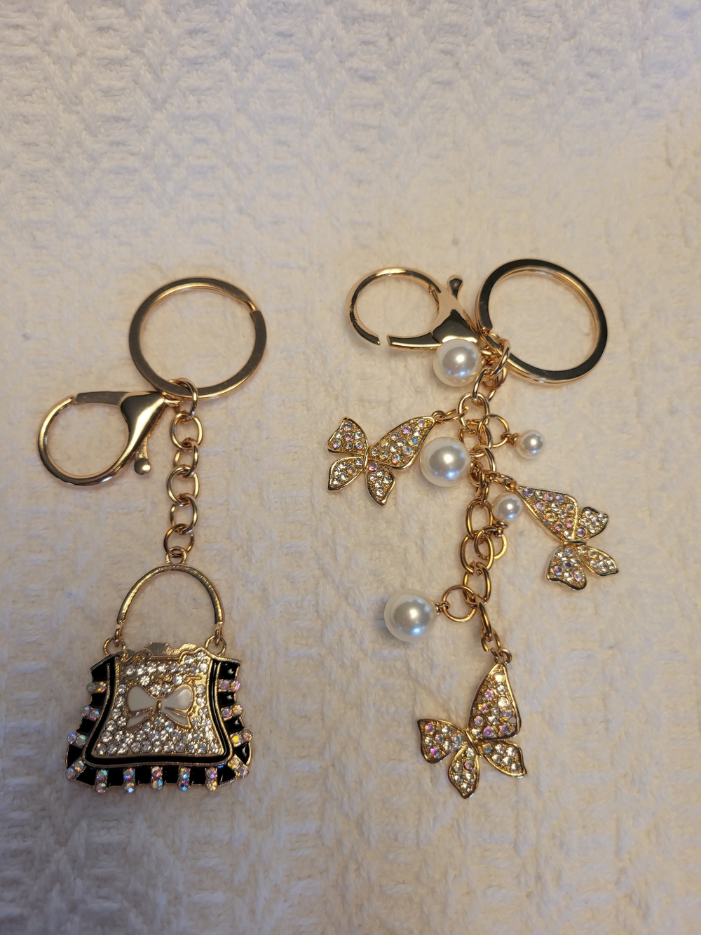 Gold Tone Jeweled Handbag And Butterflies and Pearls Keychains